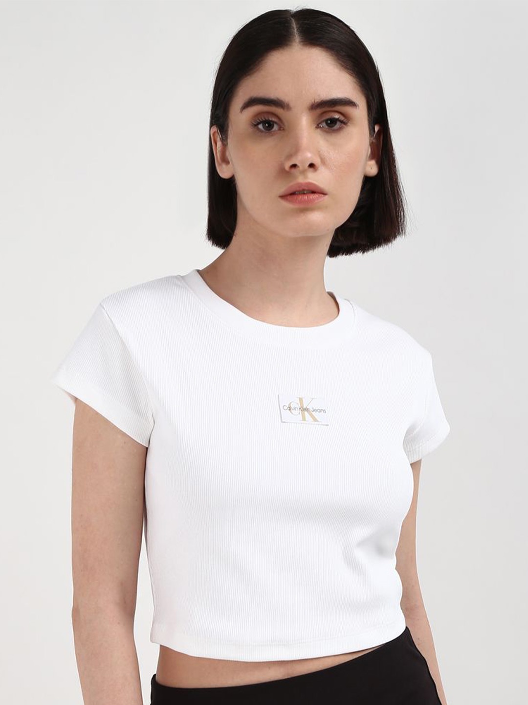 

Calvin Klein Jeans Women Solid Round Neck Crop T-shirt, White