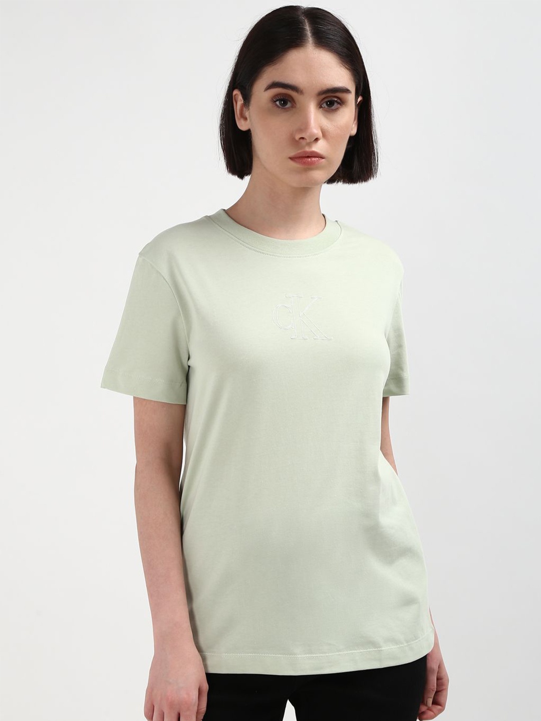 

Calvin Klein Jeans Women Solid Round Neck T-shirt, Green