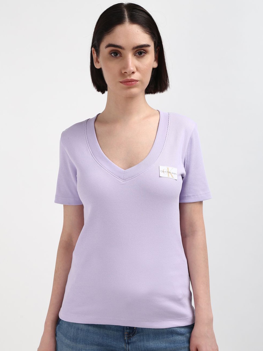 

Calvin Klein Jeans Women Solid V-Neck T-shirt, Purple