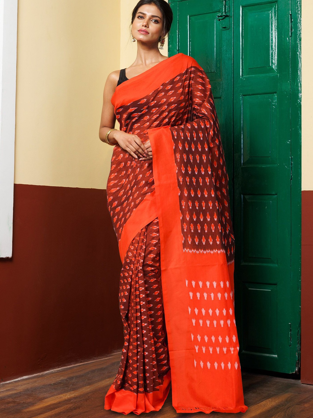 

Unnati Silks Ethnic Motifs Handloom Pochampally Saree, Rust
