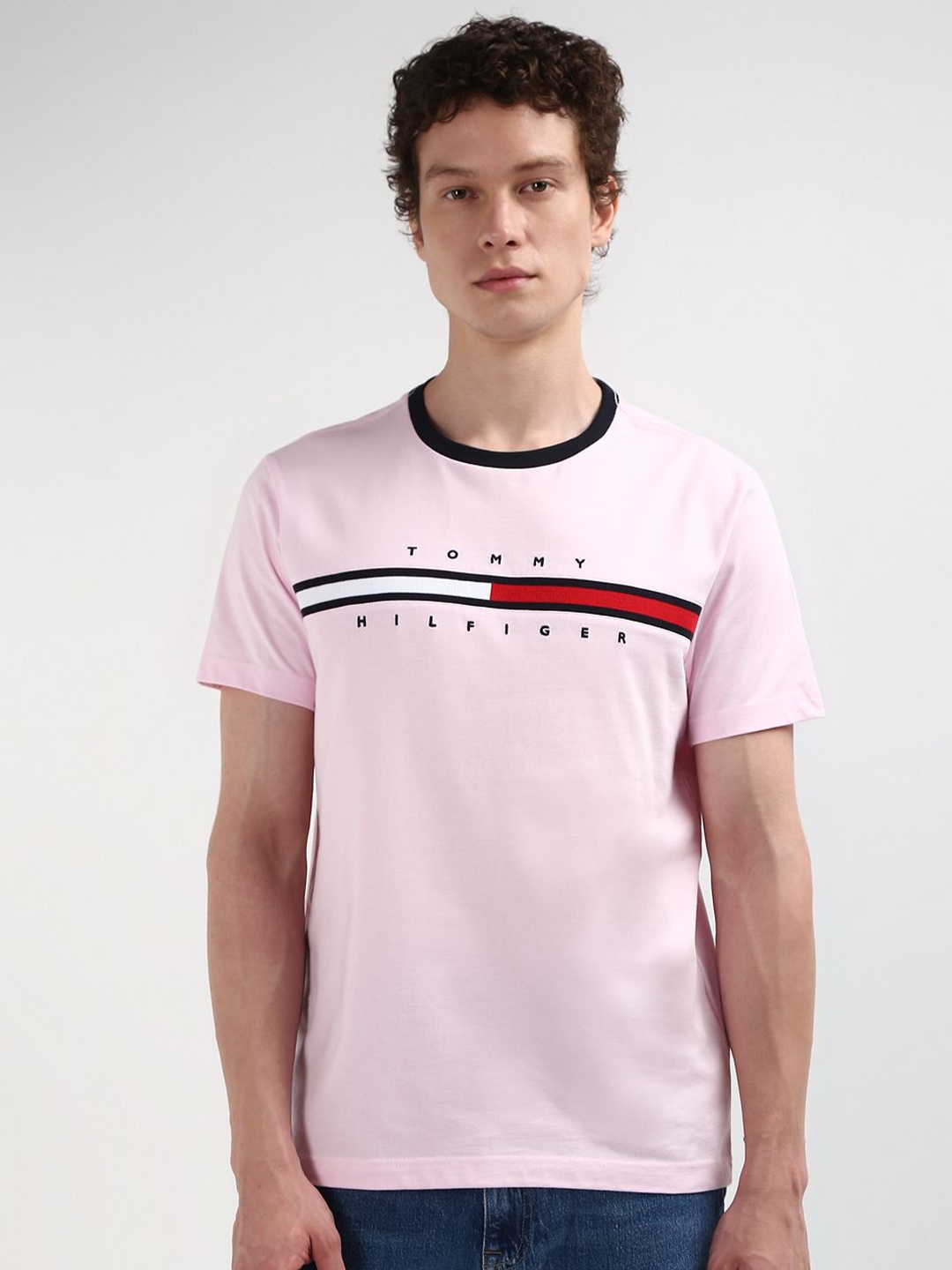 

Tommy Hilfiger Men Solid Round Neck Pure Cotton T-shirt, Pink