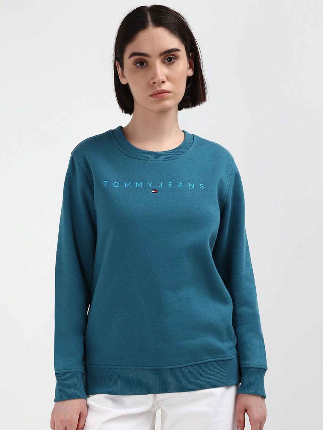 

Tommy Hilfiger Women Embroidered Solid Round Neck Cotton Sweatshirt, Teal