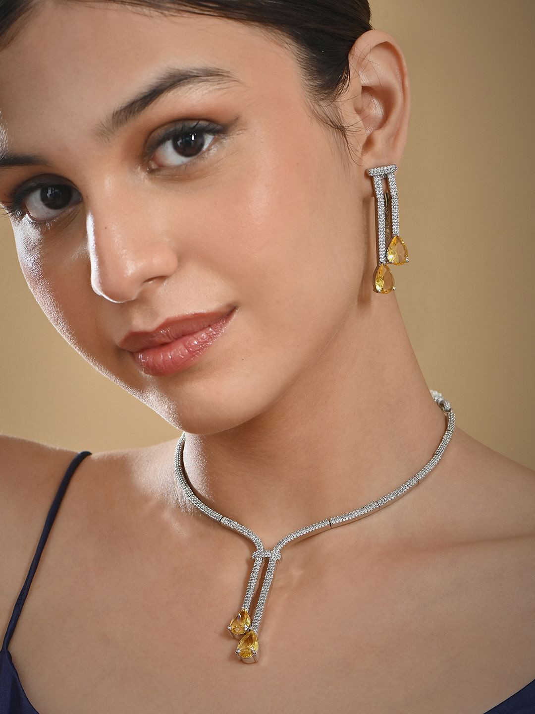 

Fida Silver-Plated AD Stone-Studded Details Necklace and Earrings
