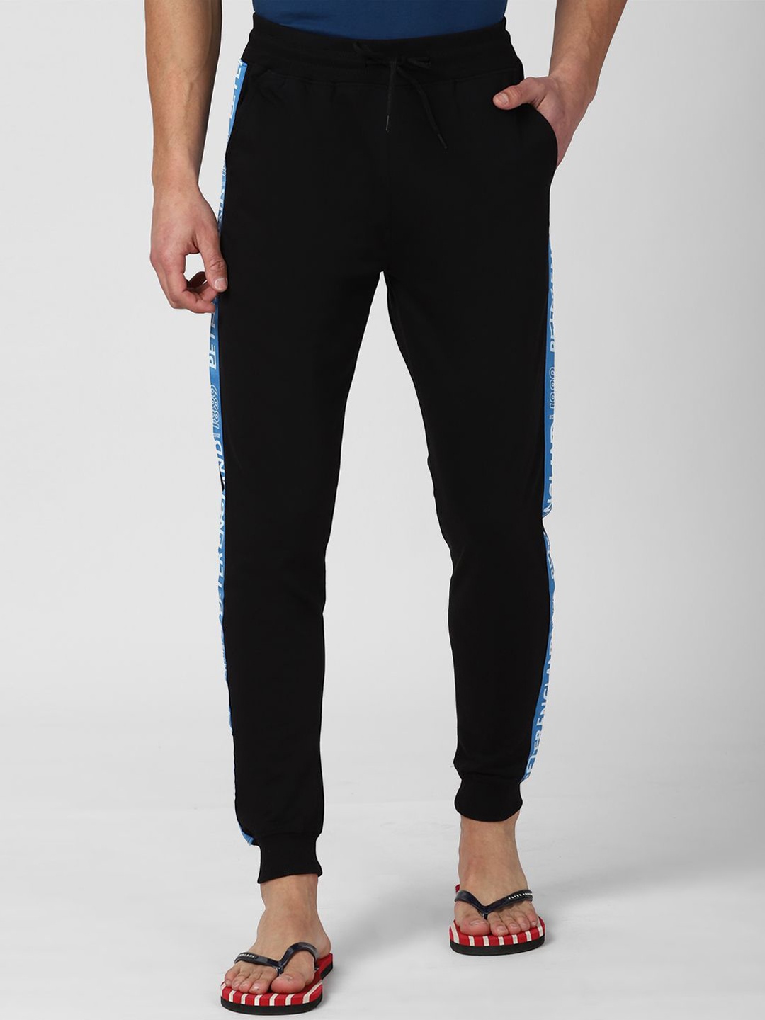 

Peter England Casuals Men Printed Mid Rise Track Pants, Black
