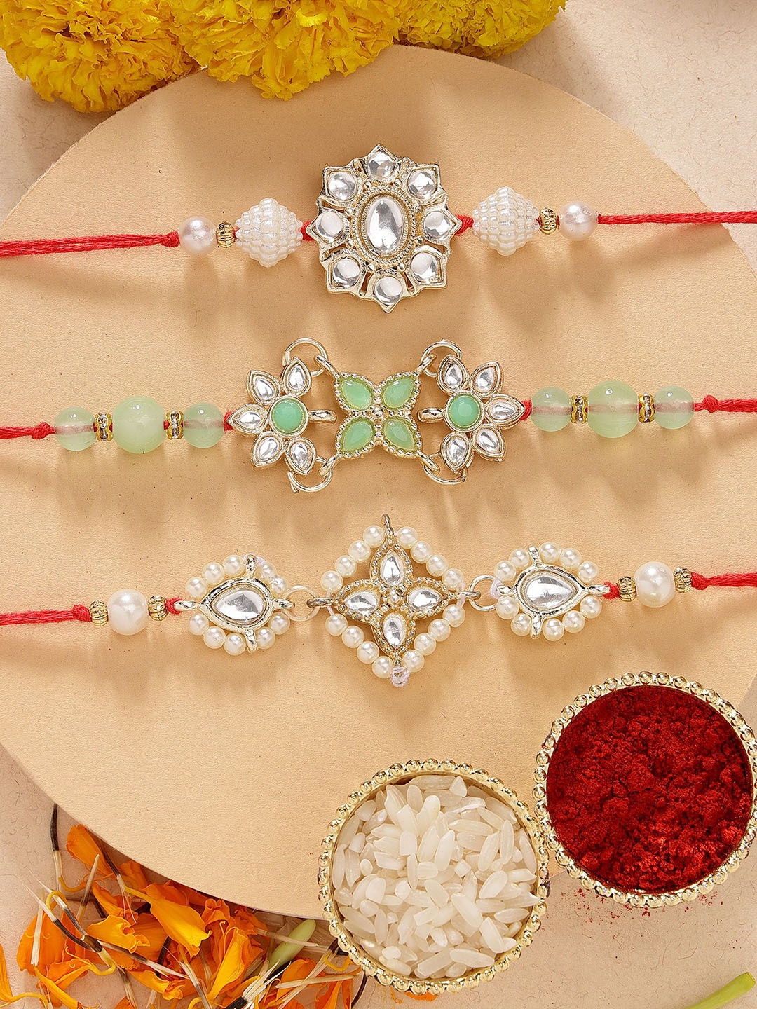 

KARATCART Set of 3 Floral Pearl & Kundan Rakhis with Roli & Chawal, Green