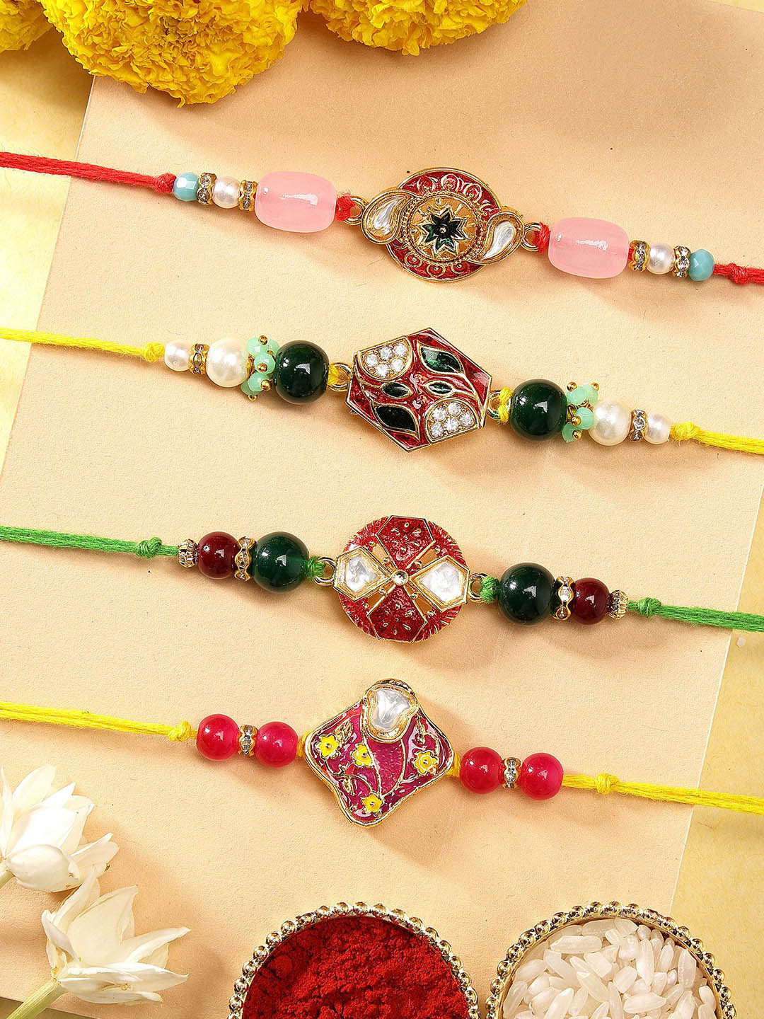 

KARATCART Set of 4 Multicolor Meenakari Kundan Rakhis with Roli & Chawal, Gold