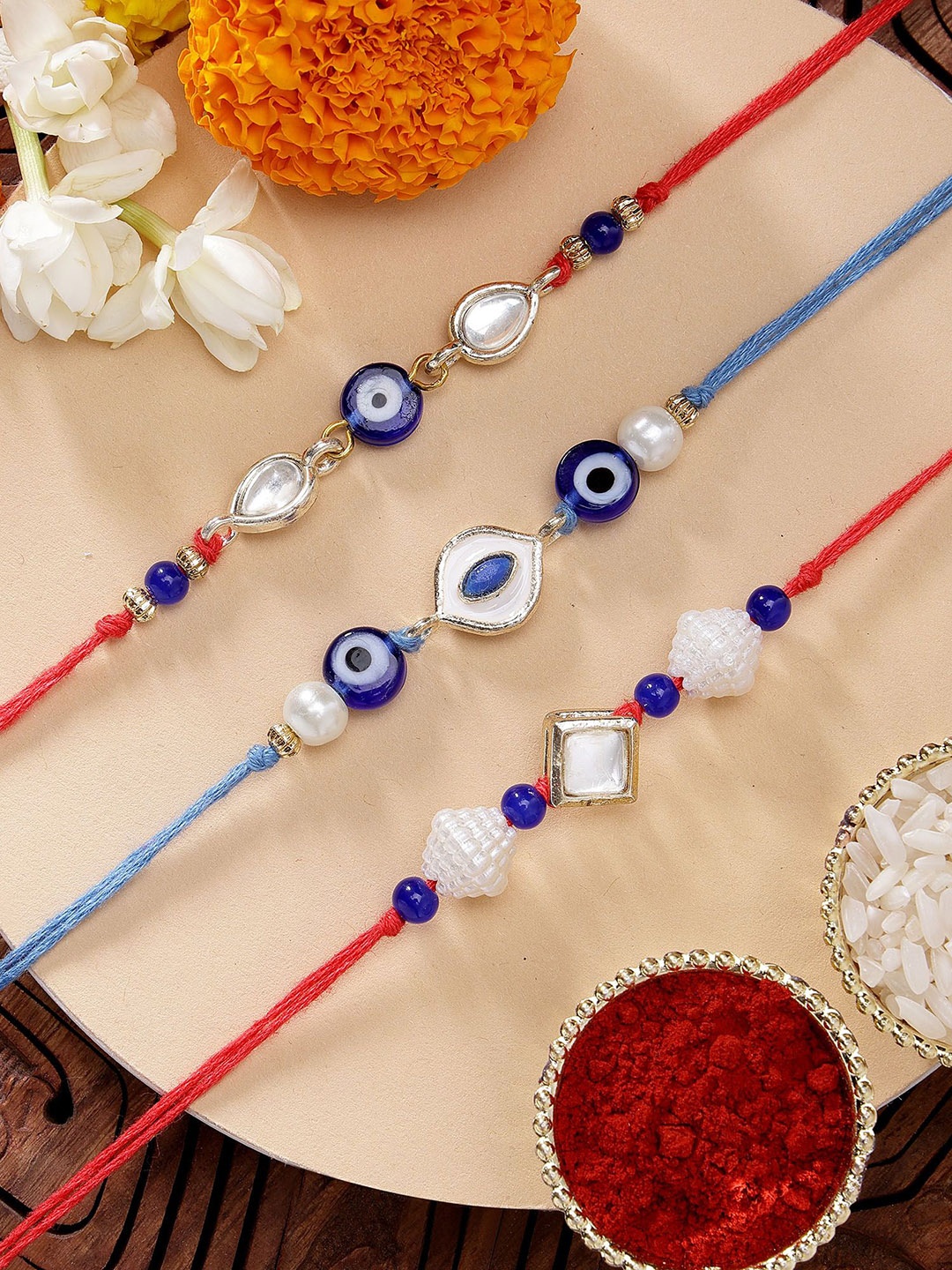 

KARATCART Set of 3 Meenakari Evil Eye Kundan Rakhis with Roli & Chawal, Red