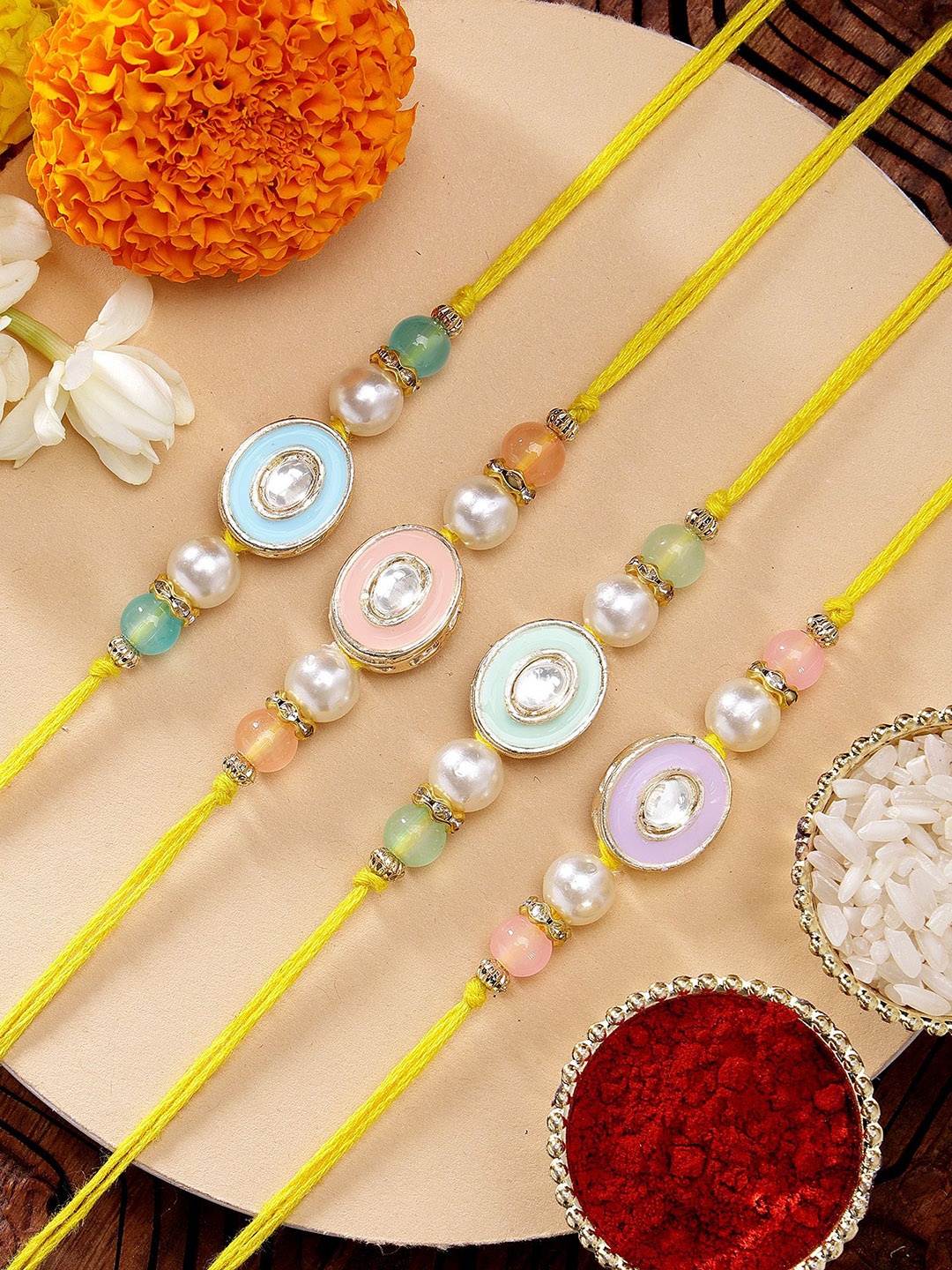 

KARATCART Set of 4 Multicolor Meenakari Kundan Rakhis with Roli & Chawal, Yellow