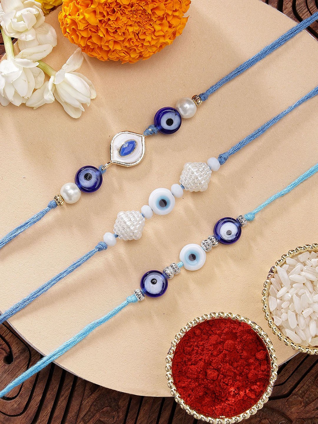 

KARATCART Set of 3 Meenakari Evil Eye Kundan Rakhis with Roli & Chawal, Blue