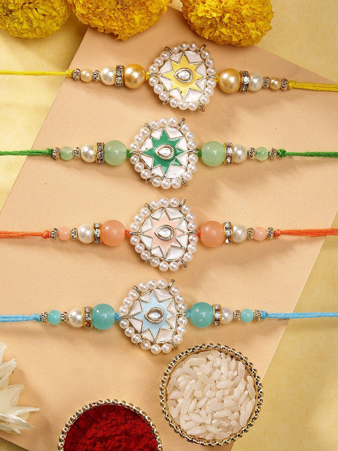 

KARATCART Set of 4 Meenakari Heart Shape Kundan Rakhis with Roli & Chawal, Blue