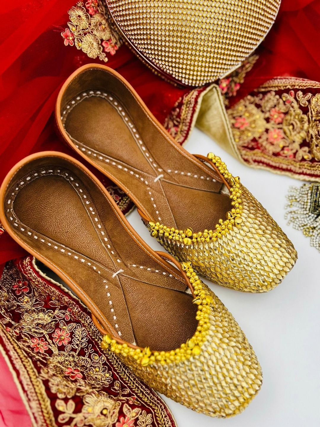 

PehnawaCraft Embellished Golden stone & Ghungroo handcrafted leather mojaris, Gold