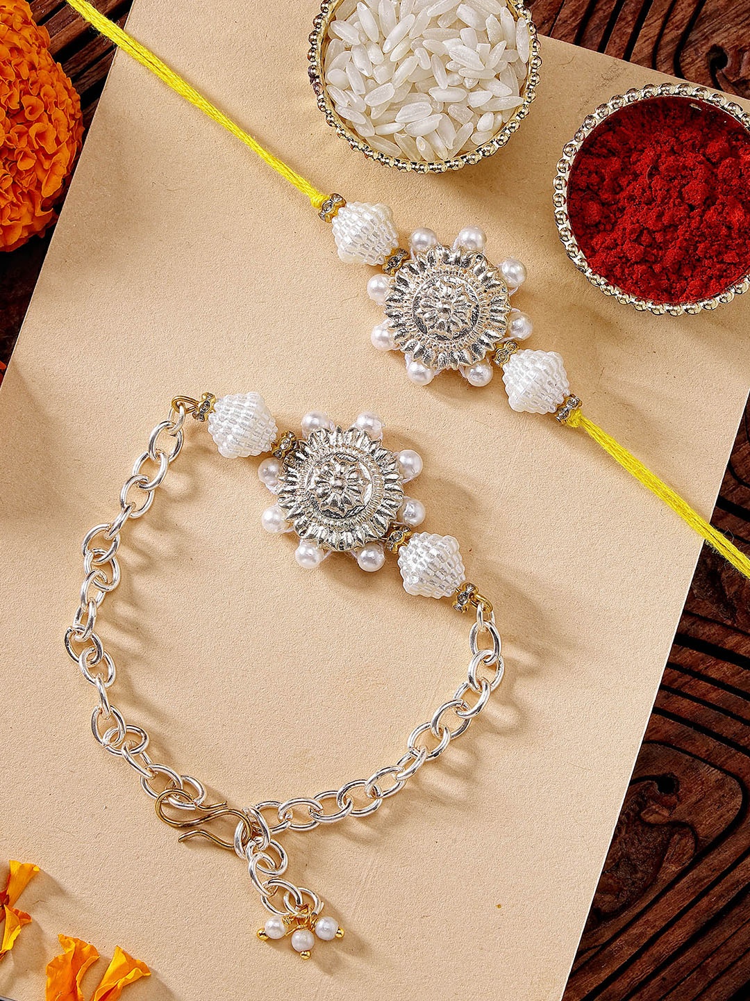 

KARATCART Gold Plated Floral Pearl Kundan Bhaiya Bhabhi Rakhi with Roli & Chawal