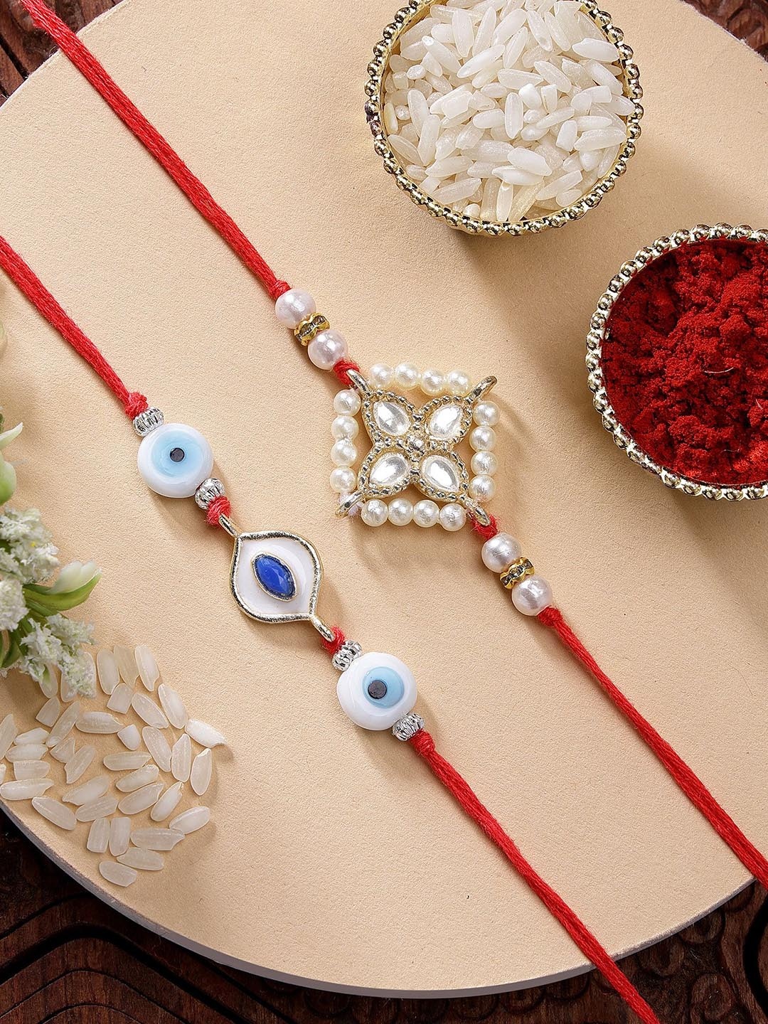 

KARATCART Set of 2 Blue Evil Eye Meenakari Kundan Rakhi with Roli & Chawal
