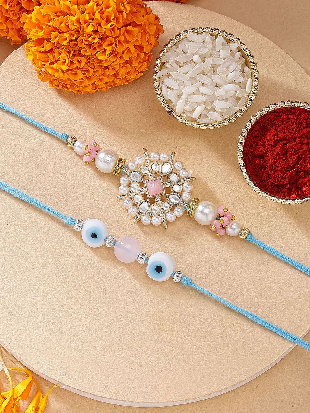 

KARATCART Set of 2 Evil Eye & Pink Floral Kundan Rakhi with Roli & Chawal, Blue