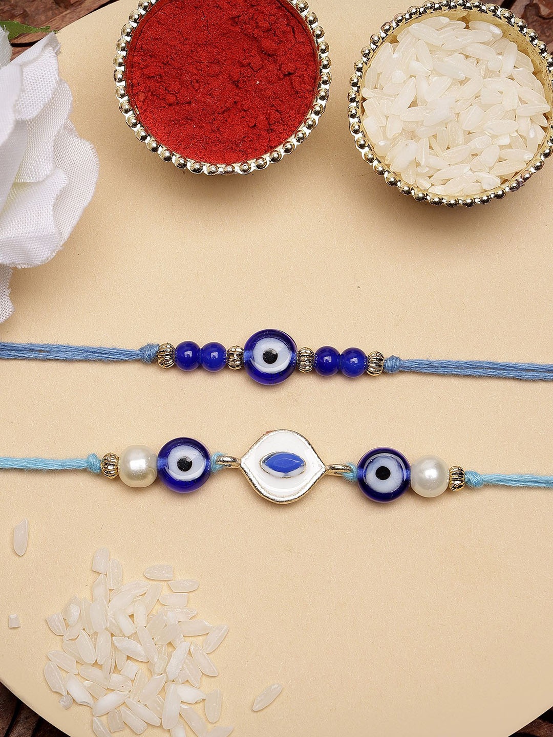 

KARATCART Set of 2 Blue Evil Eye Meenakari Kundan Rakhi with Roli & Chawal