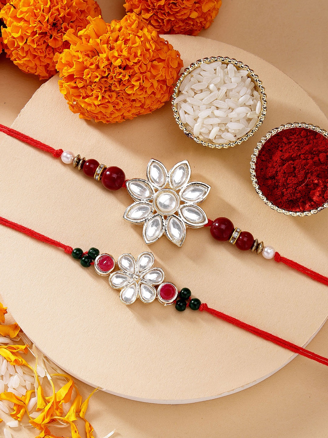 

KARATCART Set of 2 Floral Design Kundan Red Beads Rakhi with Roli & Chawal