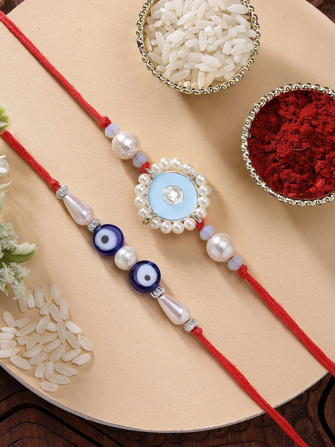 

KARATCART Set of 2 Blue Evil Eye Kundan Rakhi with Roli & Chawal, Red