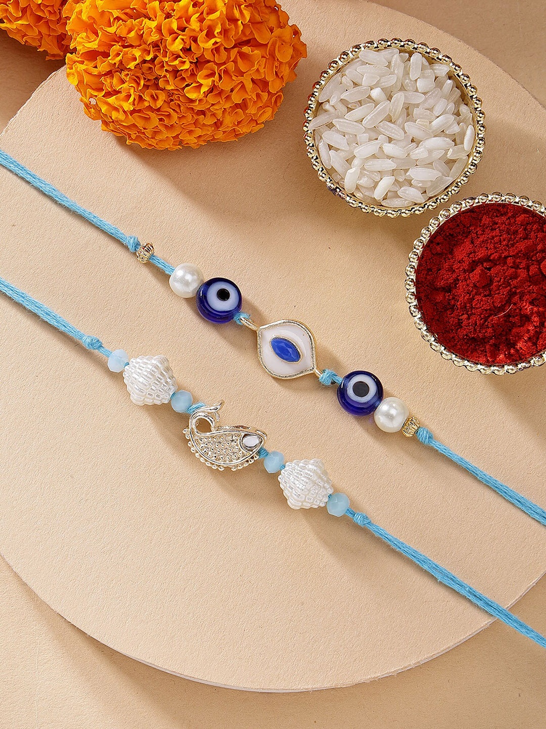 

KARATCART Set of 2 Meenakari Evil Eye & Fish Kundan Rakhi with Roli & Chawal, Blue