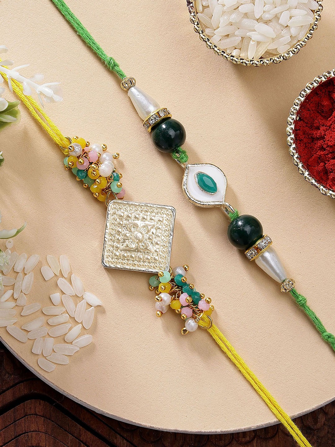 

KARATCART Set of 2 Crystal & Green Evil Eye Kundan Rakhi with Roli & Chawal, Black
