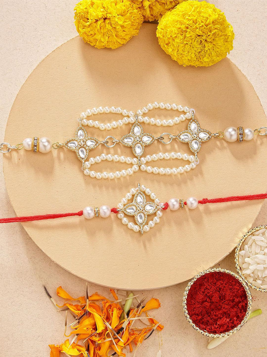 

KARATCART Gold Plated Diamond Floral Design Kundan Bhaiya Bhabhi Rakhi with Roli & Chawal