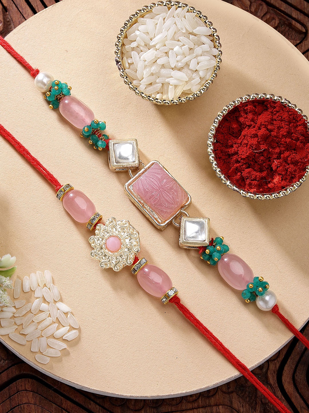 

KARATCART Set of 2 Pink Carved Stone Floral Kundan Rakhi with Roli & Chawal, Red