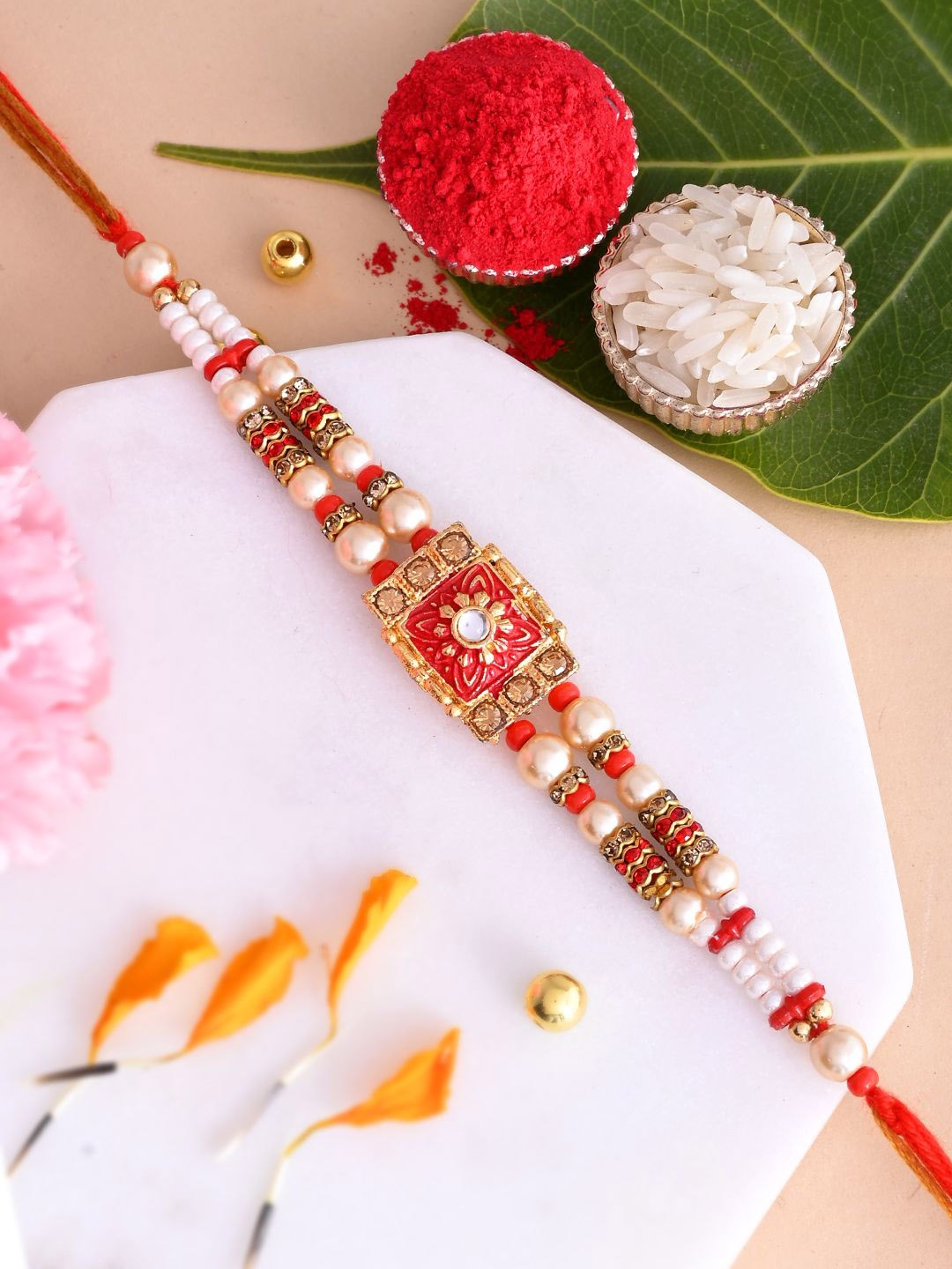 

Aapno Rajasthan Stone Studded Meenakari Rakhi With Roli Chawal & Greetings Card, Red