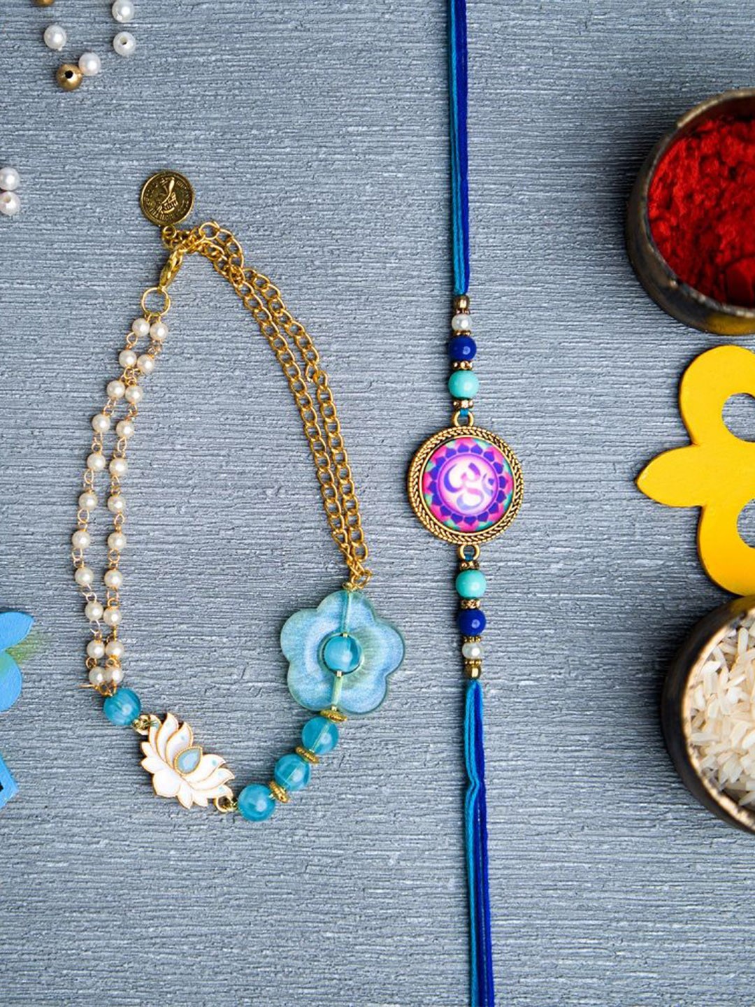 

Phirki Studio Set of 2 Beaded Thread Rakhis with Roli Chawal, Blue