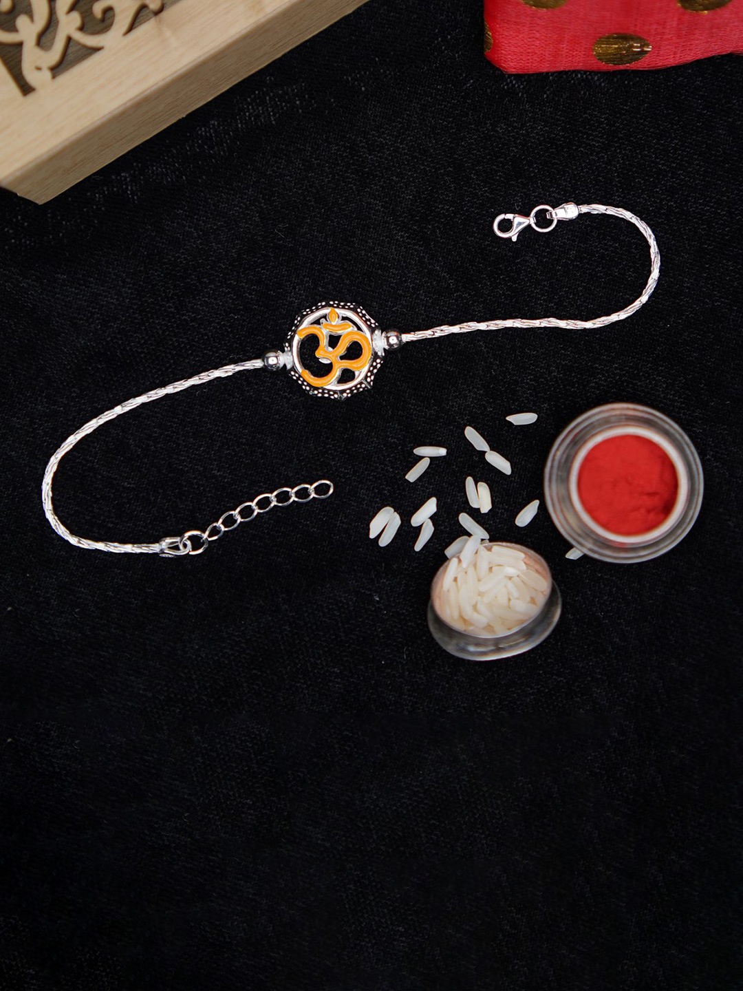 

Phirki Studio OM Rakhi With Roli Chawal, Silver