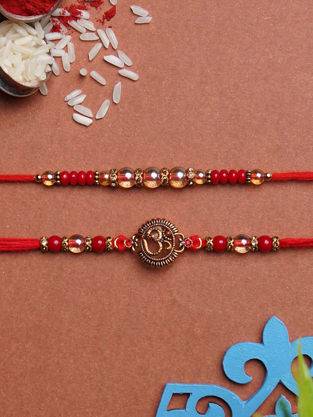 

Phirki Studio Set Of 2 Stone Studded & Beaded Rakhi With Roli Chawal, Red