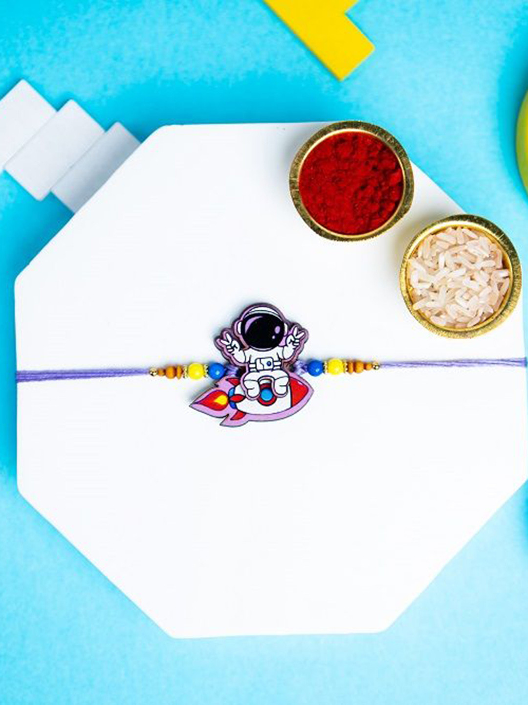 

Phirki Studio Beaded Thread Rakhi with Roli Chawal, Blue