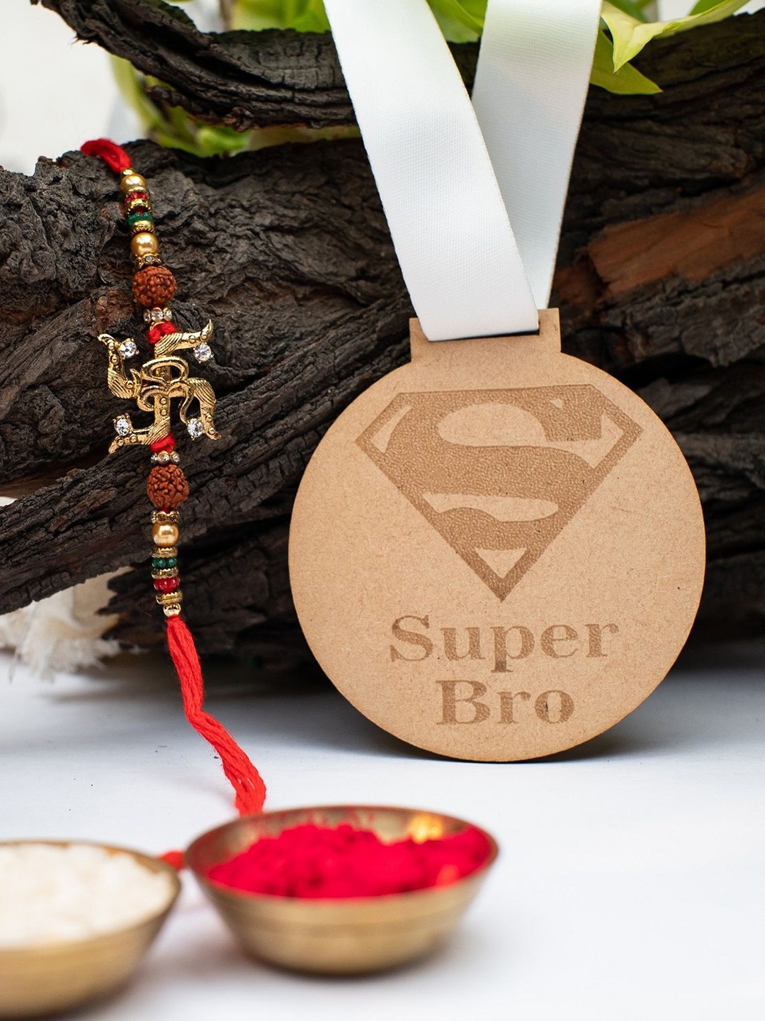 

Phirki Studio Rakhi With Wooden Medal & Roli Chawal, White