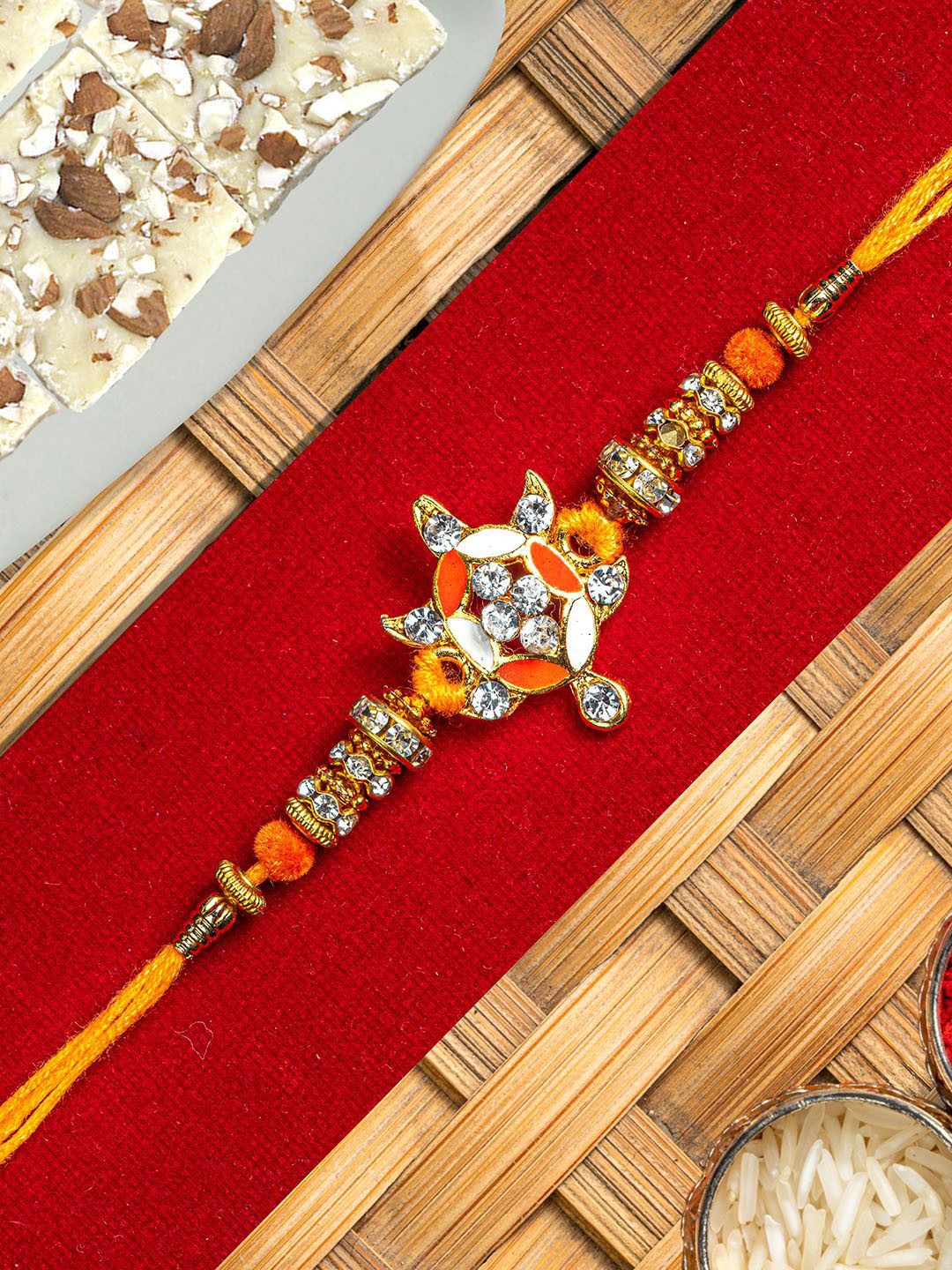 

Tied Ribbons Premium Rakhi, Card & Roli Chawal Gift Set, Orange