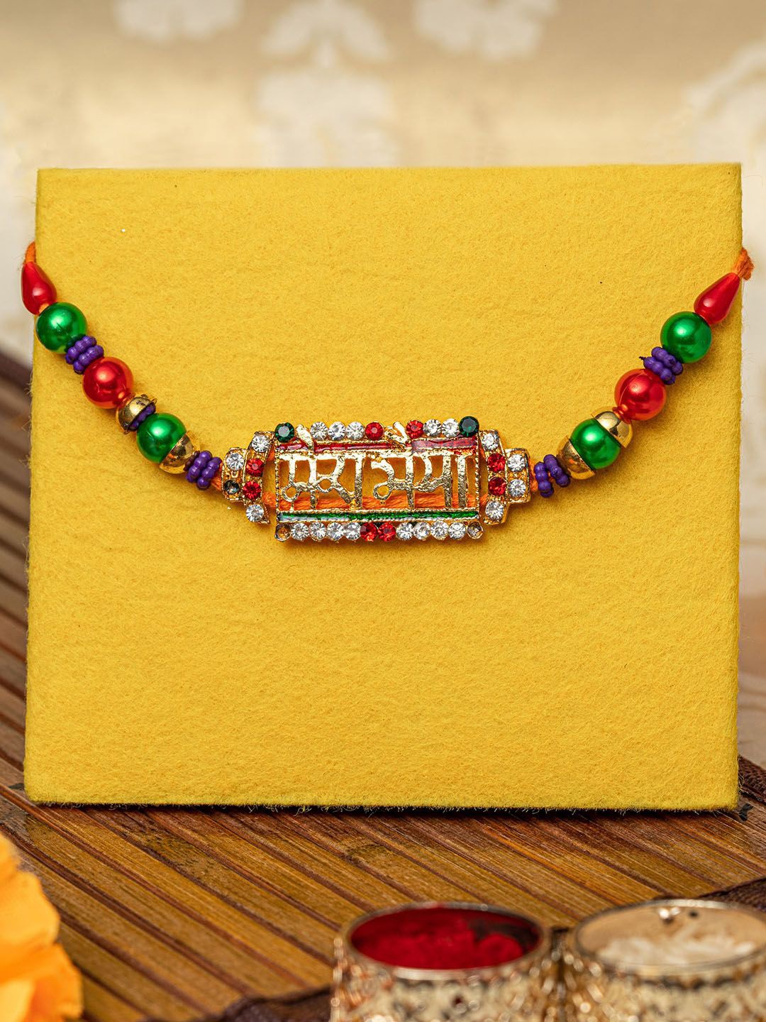 

Tied Ribbons Rakhi, Card & Roli Chawal Set, Gold