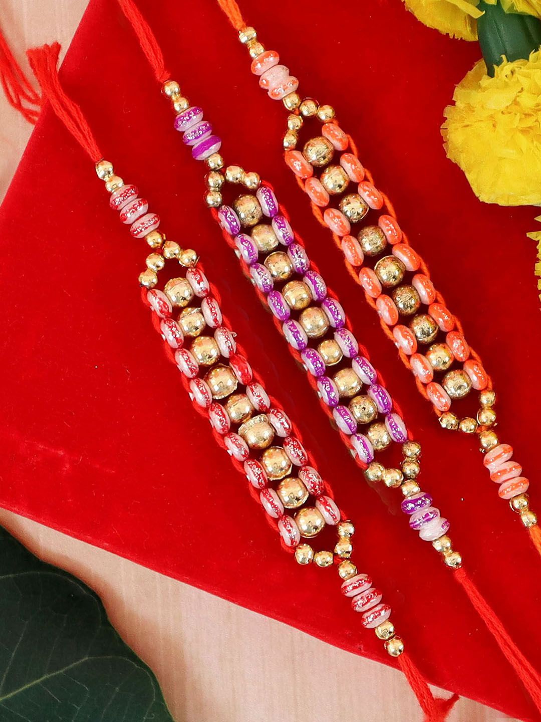 

Tied Ribbons Set of 3 Premium Rakhis, Card & Roli Chawal Pack, Gold