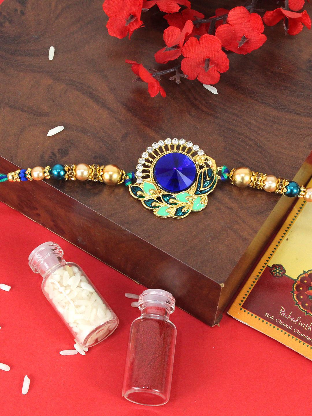 

TIED RIBBONS Peacock Rakhi With Card & Roli Chawal, Blue