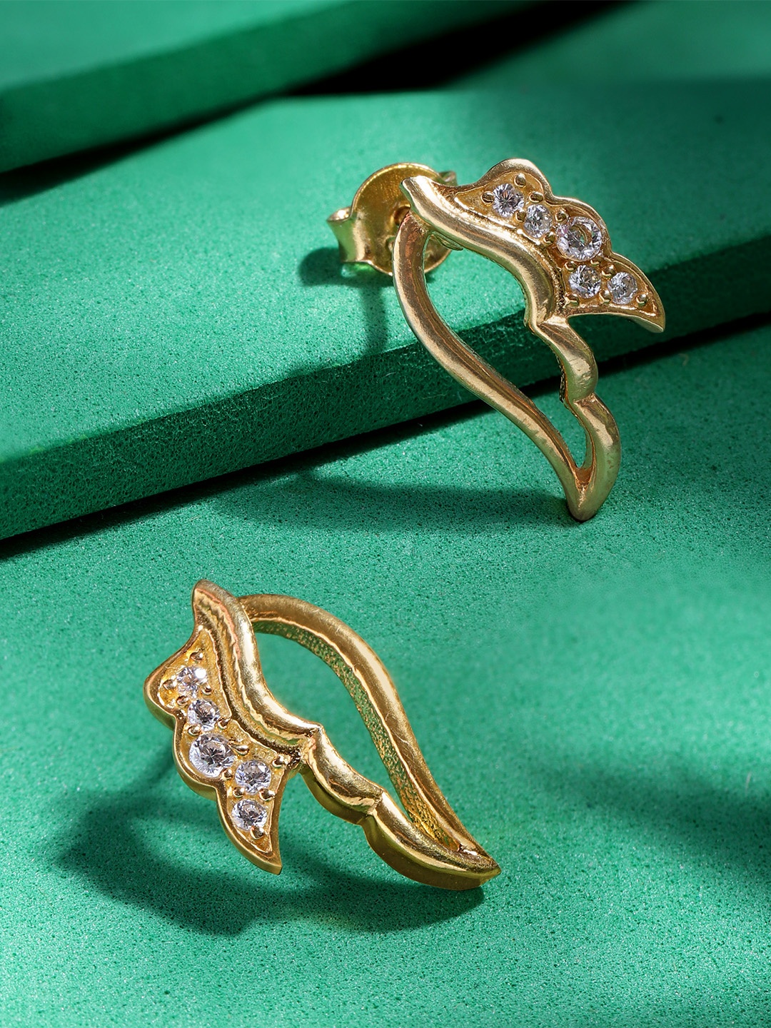 

Unniyarcha Gold-Plated Stones-Studded Leaf Shaped Studs Earrings, Silver