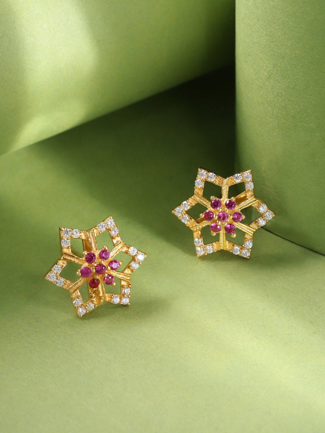 

Unniyarcha Gold-Plated Floral Stones-Studded Studs