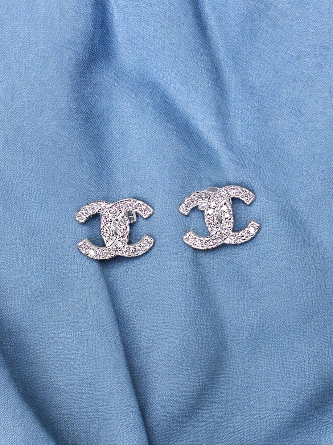 

Taraash Silver-Plated 925 Sterling Silver Cubic Zirconia Contemporary Studs Earrings