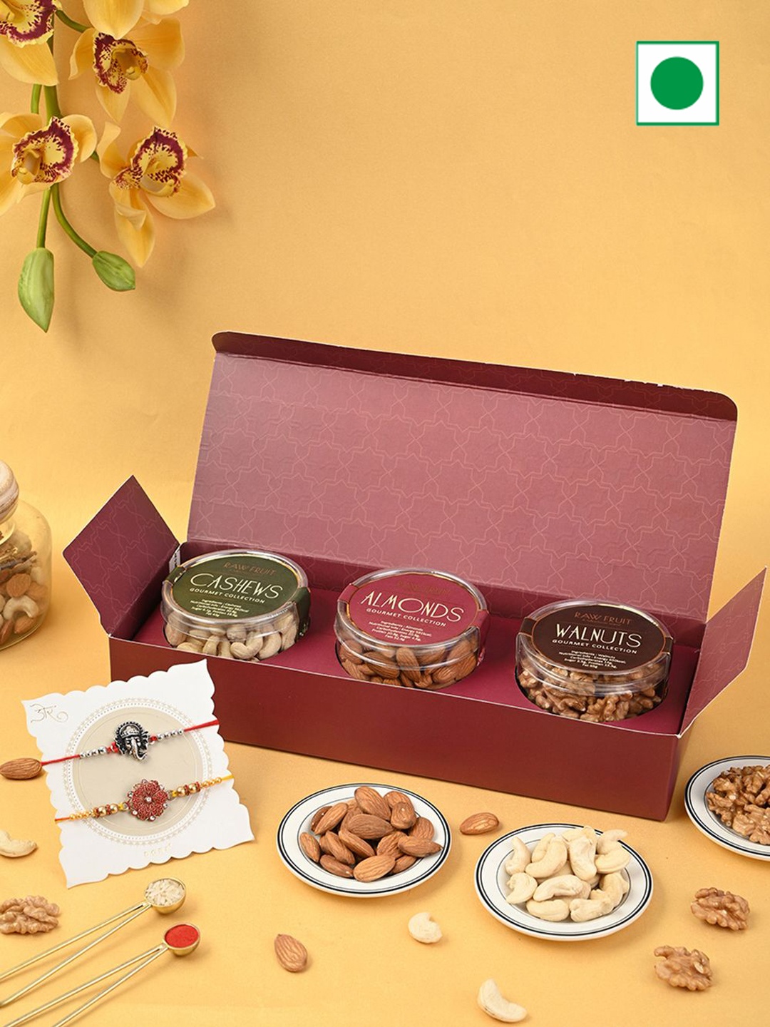 

Raw Fruit Set of 2 Rakhi & Dry Fruits Gift Pack, Maroon