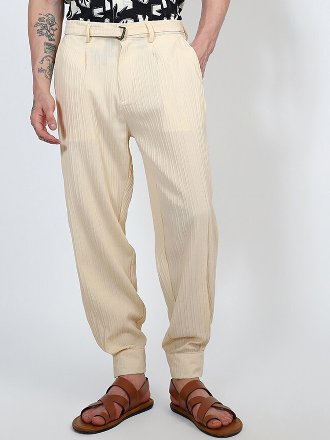 

Campus Sutra Men Comfort Easy Wash Pleated Joggers Trousers, Yellow