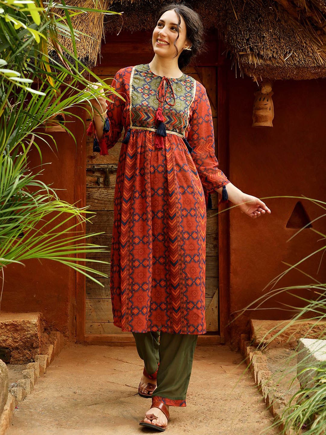 

QISSA Keyhole Neck Ethnic Motifs Printed Regular Sequinned Straight Kurta with Trousers, Maroon