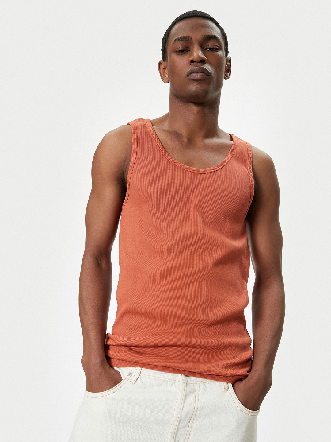 

Koton Men Solid Scoop Neck Sleeveless T-shirt, Orange