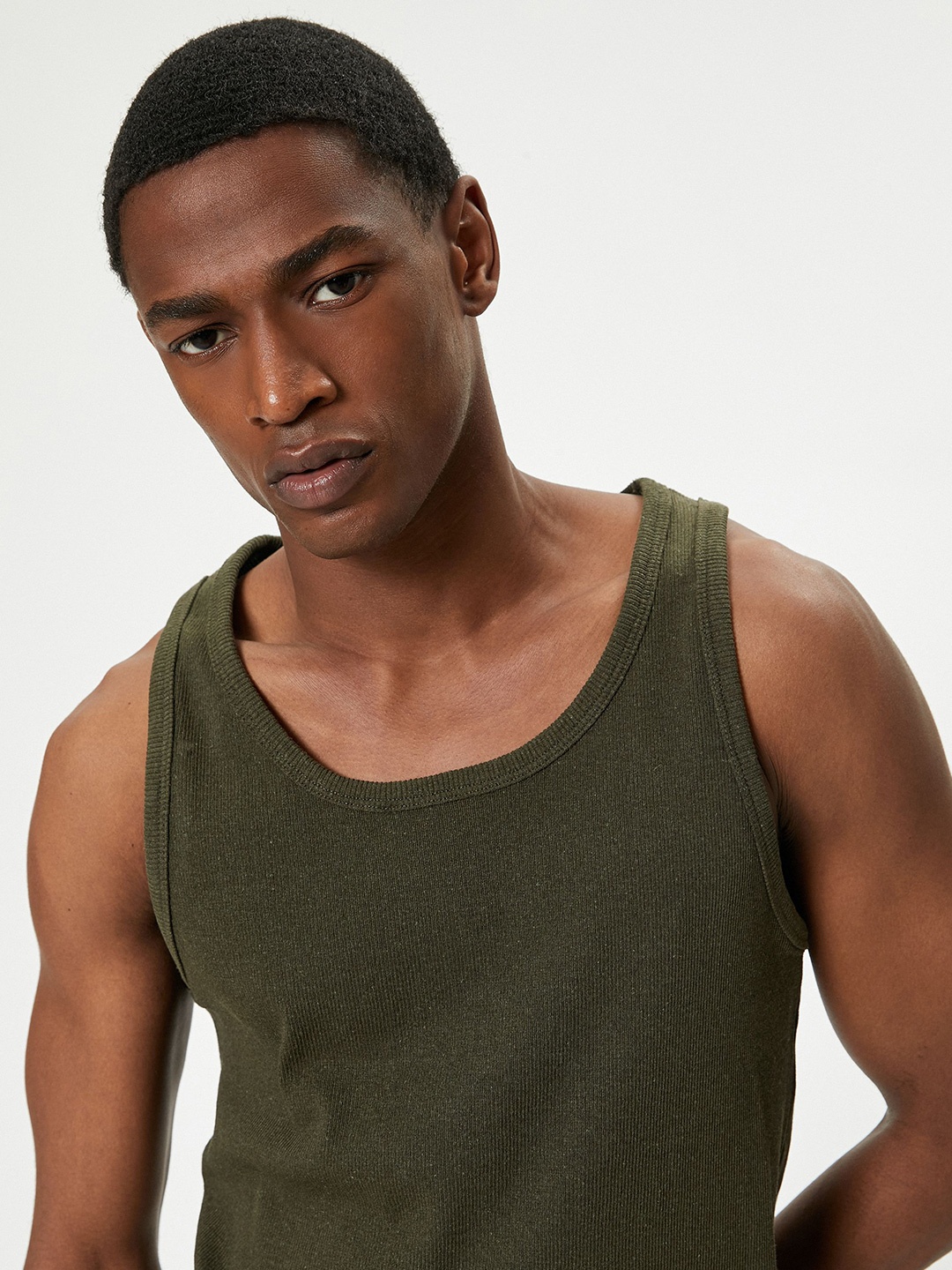 

Koton Men Solid Scoop Neck Sleeveless T-shirt, Green