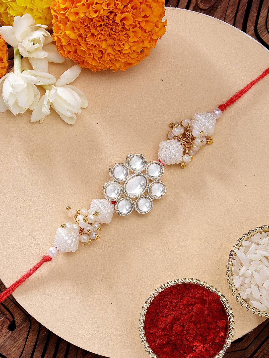 

KARATCART Golden Floral Design Pearl & Kundan Rakhi with Roli & Chawal, White