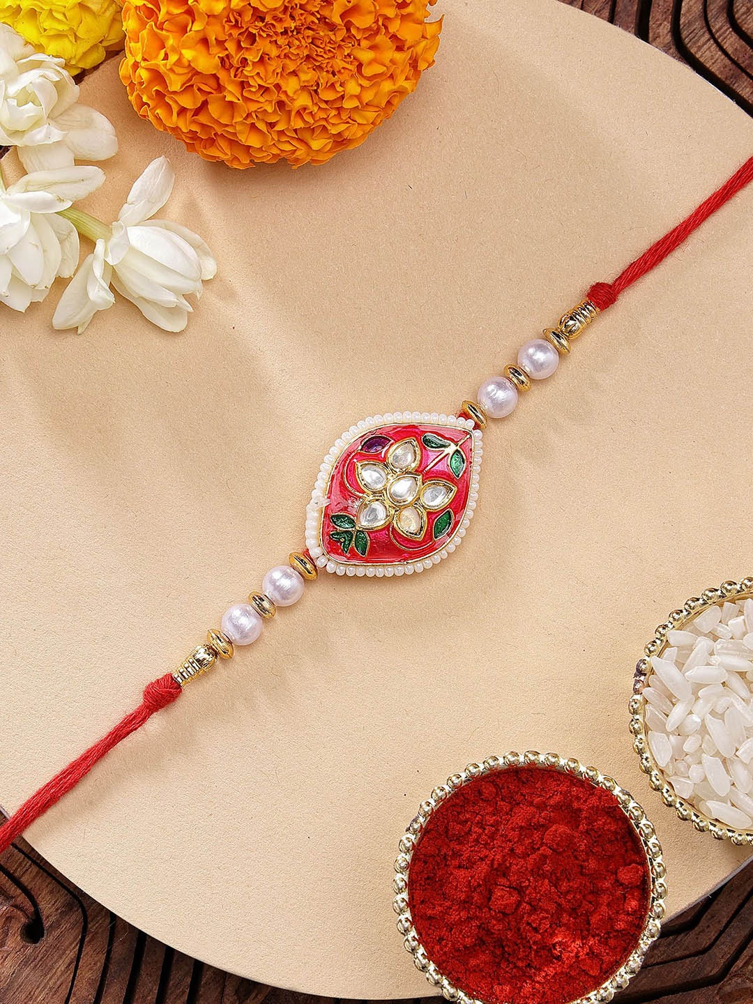

KARATCART Red Meenakari Floral Design Kundan Rakhi with Roli Chawal
