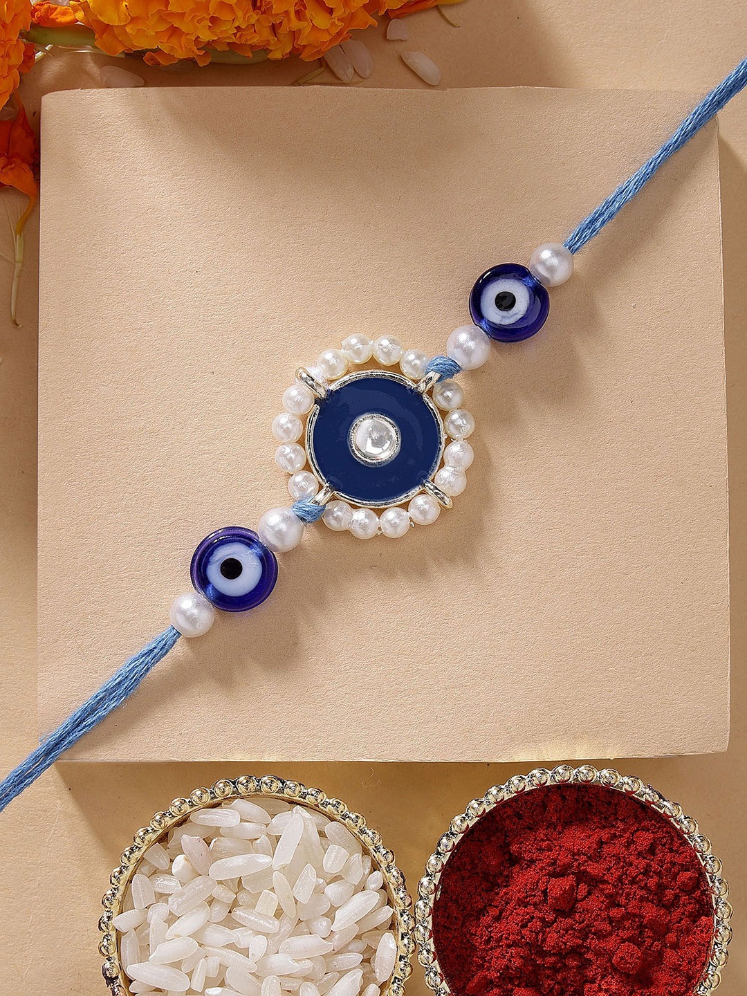 

KARATCART Blue Meena Evil Eye Design Kundan Rakhi with Roli & Chawal