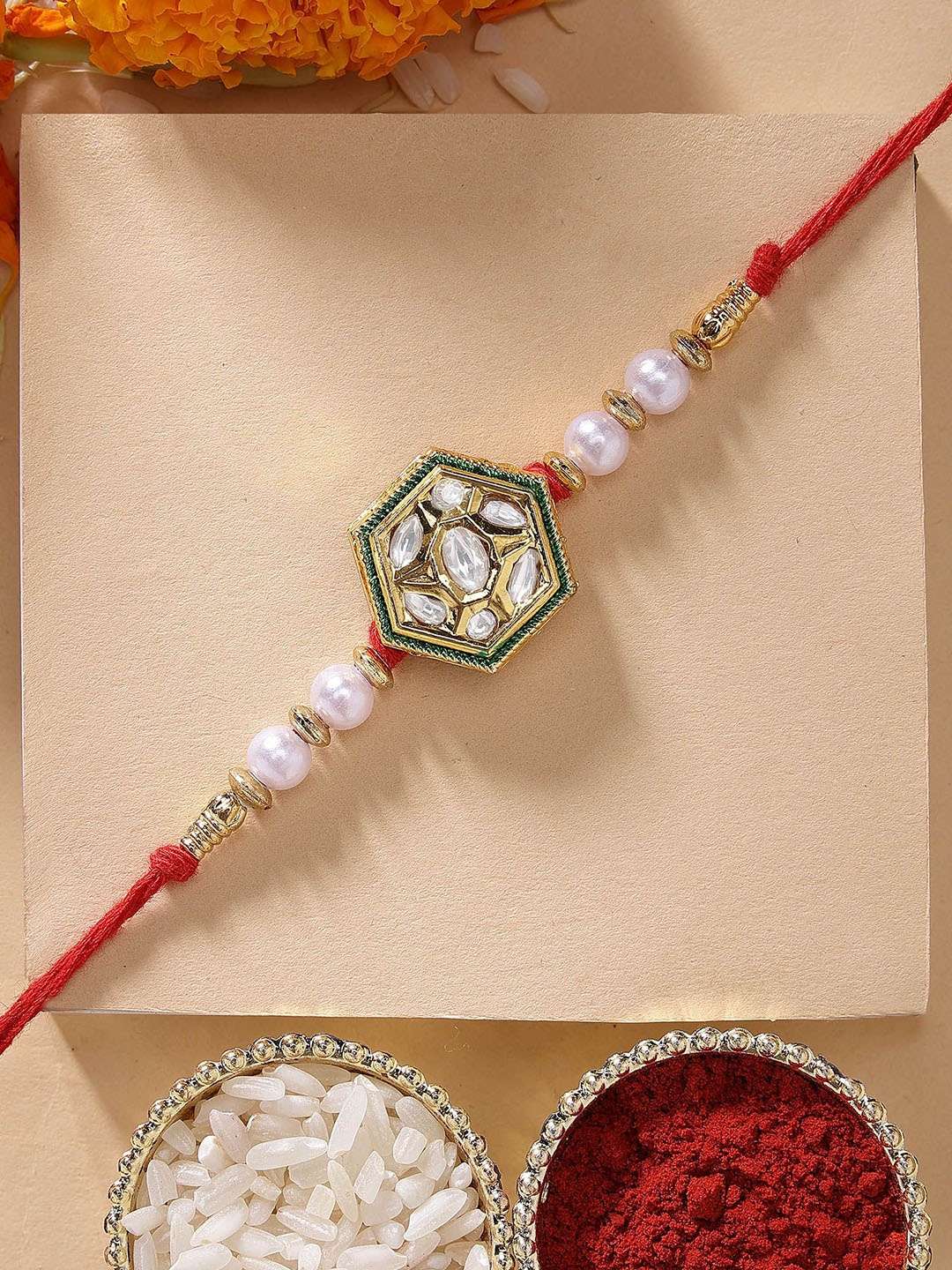 

KARATCART White Pearl & Polki Kundan Rakhi with Roli Chawal, Gold