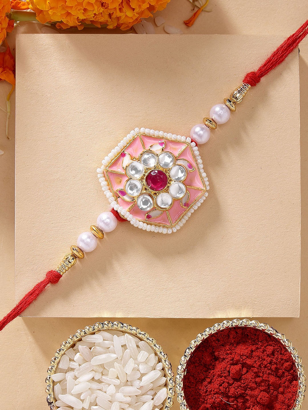 

KARATCART Pink Meenakari Floral Design Kundan Rakhi with Roli Chawal, Red