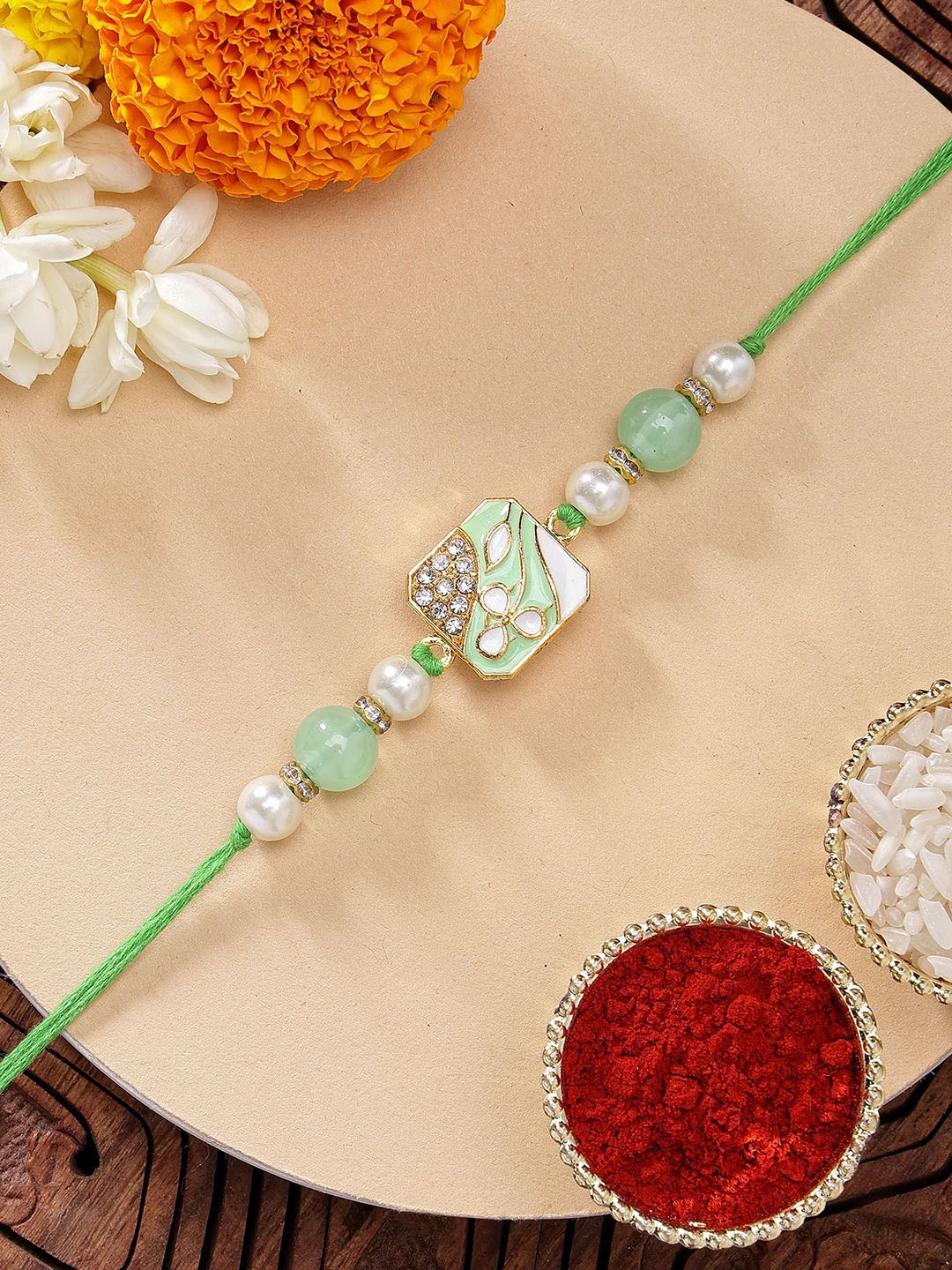 

KARATCART Green Meena Leaf Design Kundan Rakhi with Roli & Chawal, Lime green