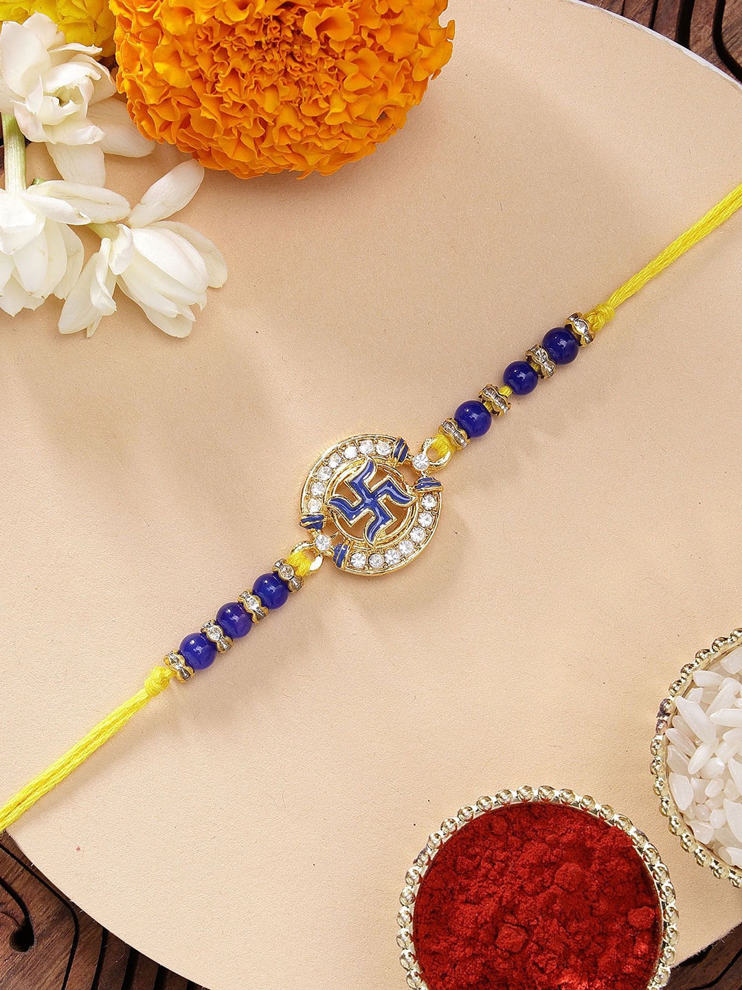 

KARATCART Blue Meenakari Swastika Design Rakhi with Roli & Chawal